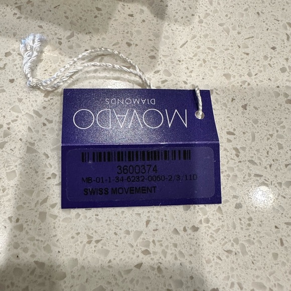 Movado gold and diamond watch. - Picture 2 of 12